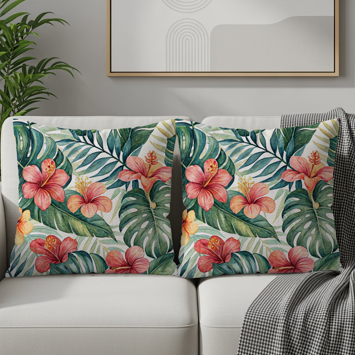 Tropical floral pattern throw pillow cover set displayed on an armchair
