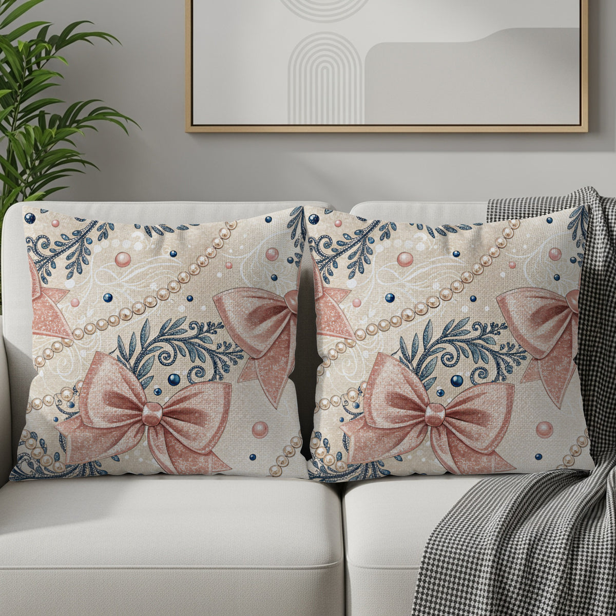 Pink bow and pearl pattern pillow covers shown as a matching pair