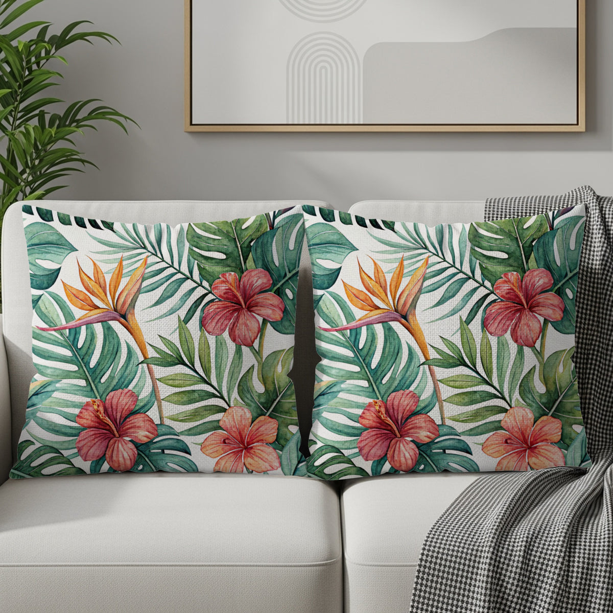Close-up detail of the tropical leaves and hibiscus flower print on the pillow cover