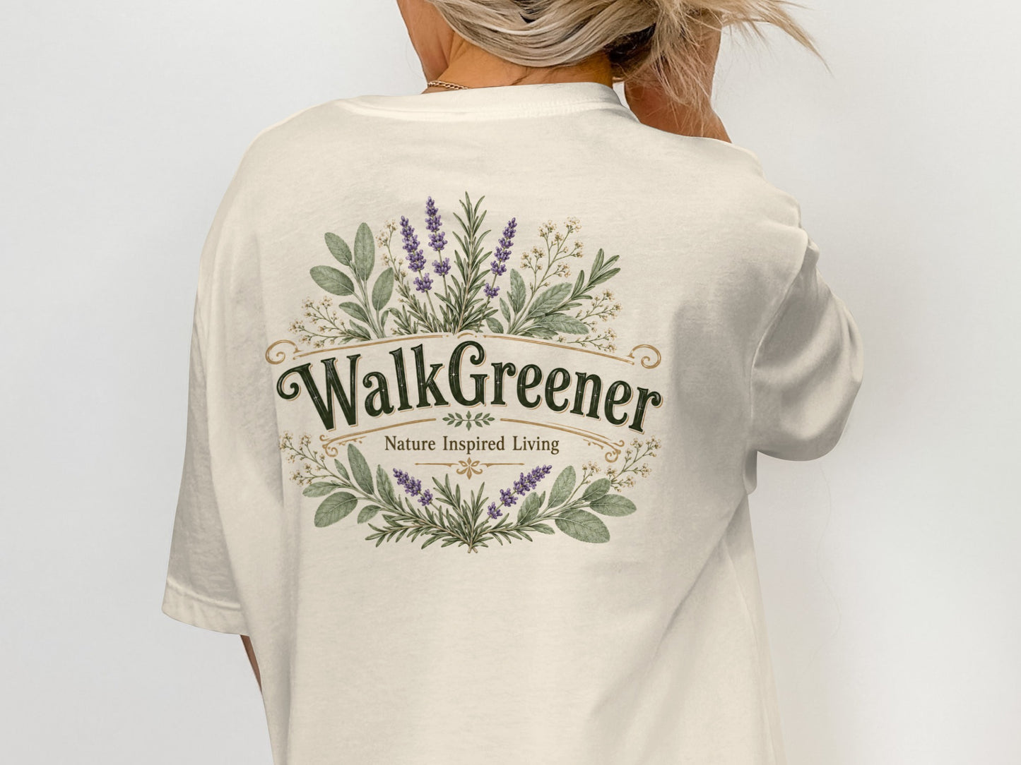 Cream t-shirt with green text "Walk Greener Nature Inspired Living" and floral design.