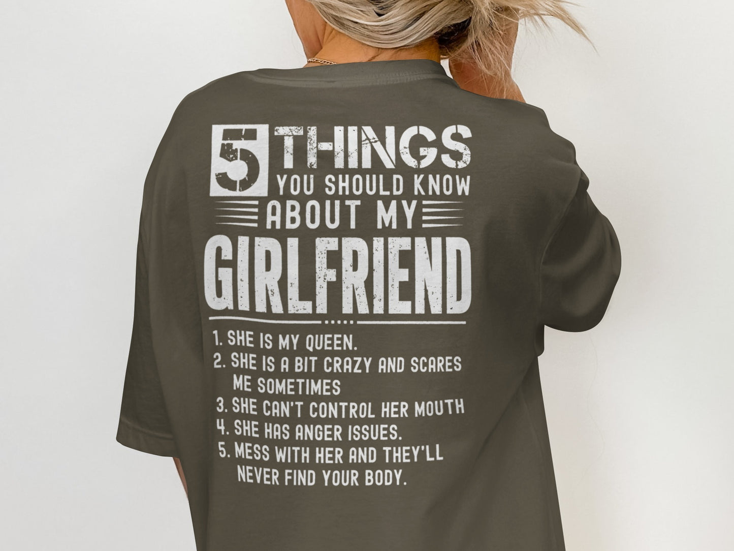 Dark t-shirt with white text listing 5 things about the wearer's girlfriend.
