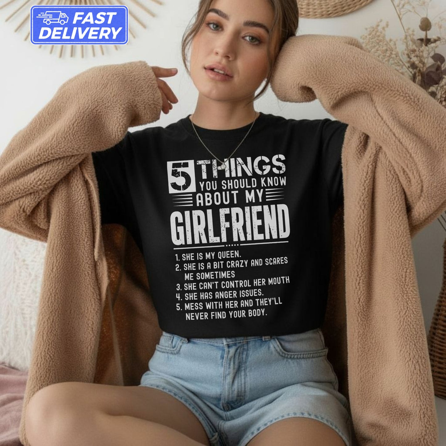 Black t-shirt with "5 Things You Should Know About My Girlfriend" text and list.
