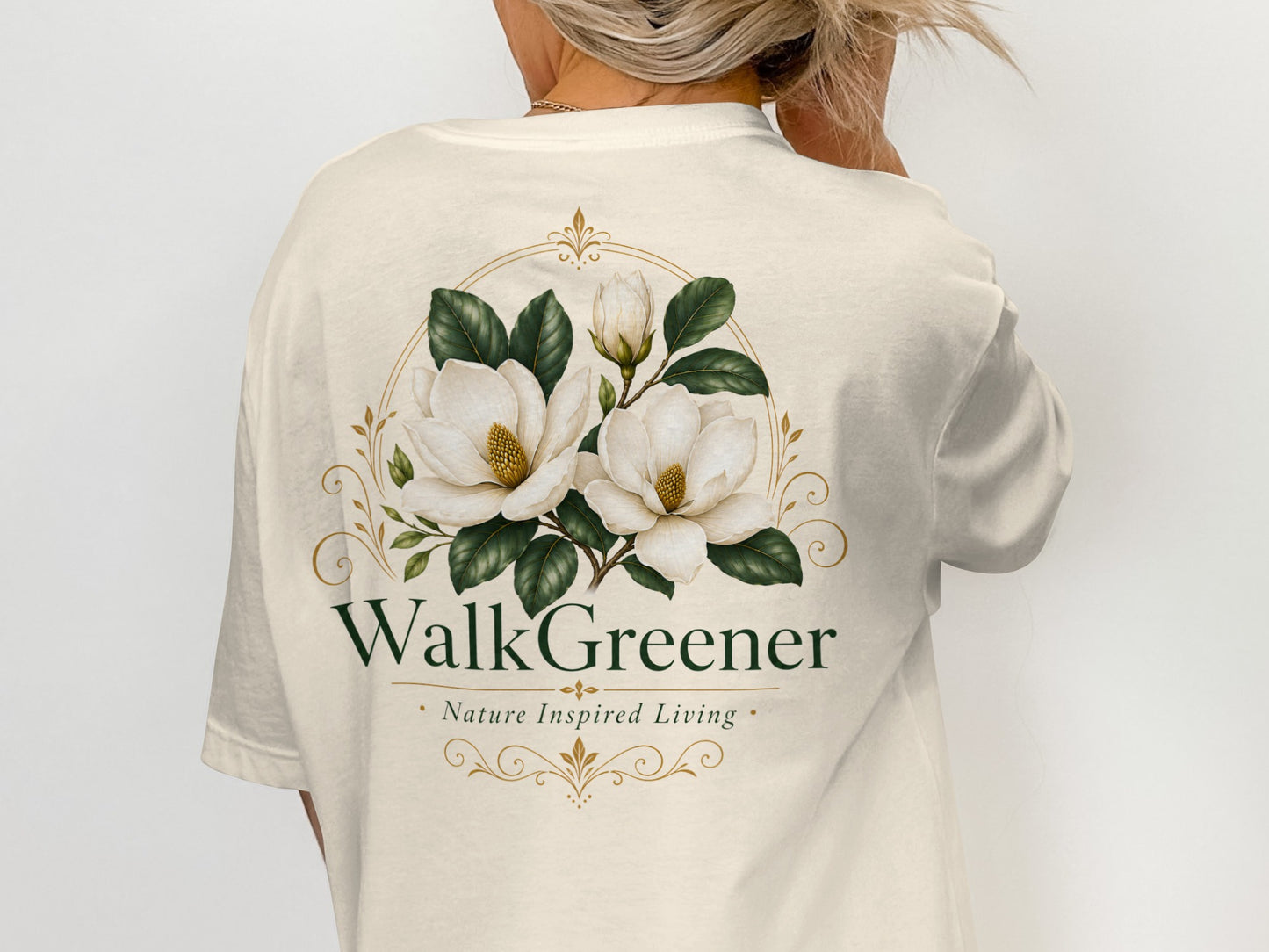 Cream t-shirt with "WalkGreener Nature Inspired Living" and magnolia flowers.