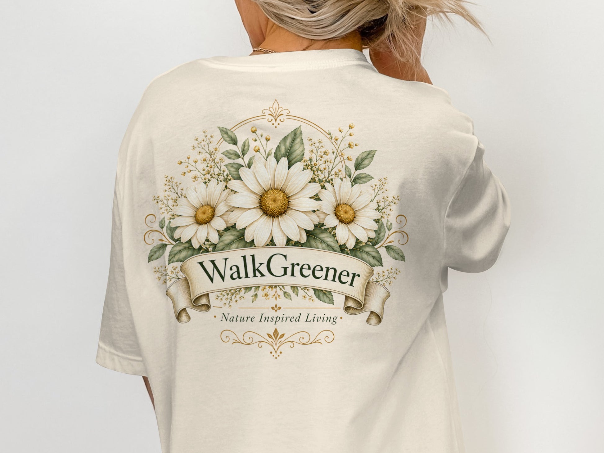 Cream t-shirt with floral design and "WalkGreener Nature Inspired Living" text.