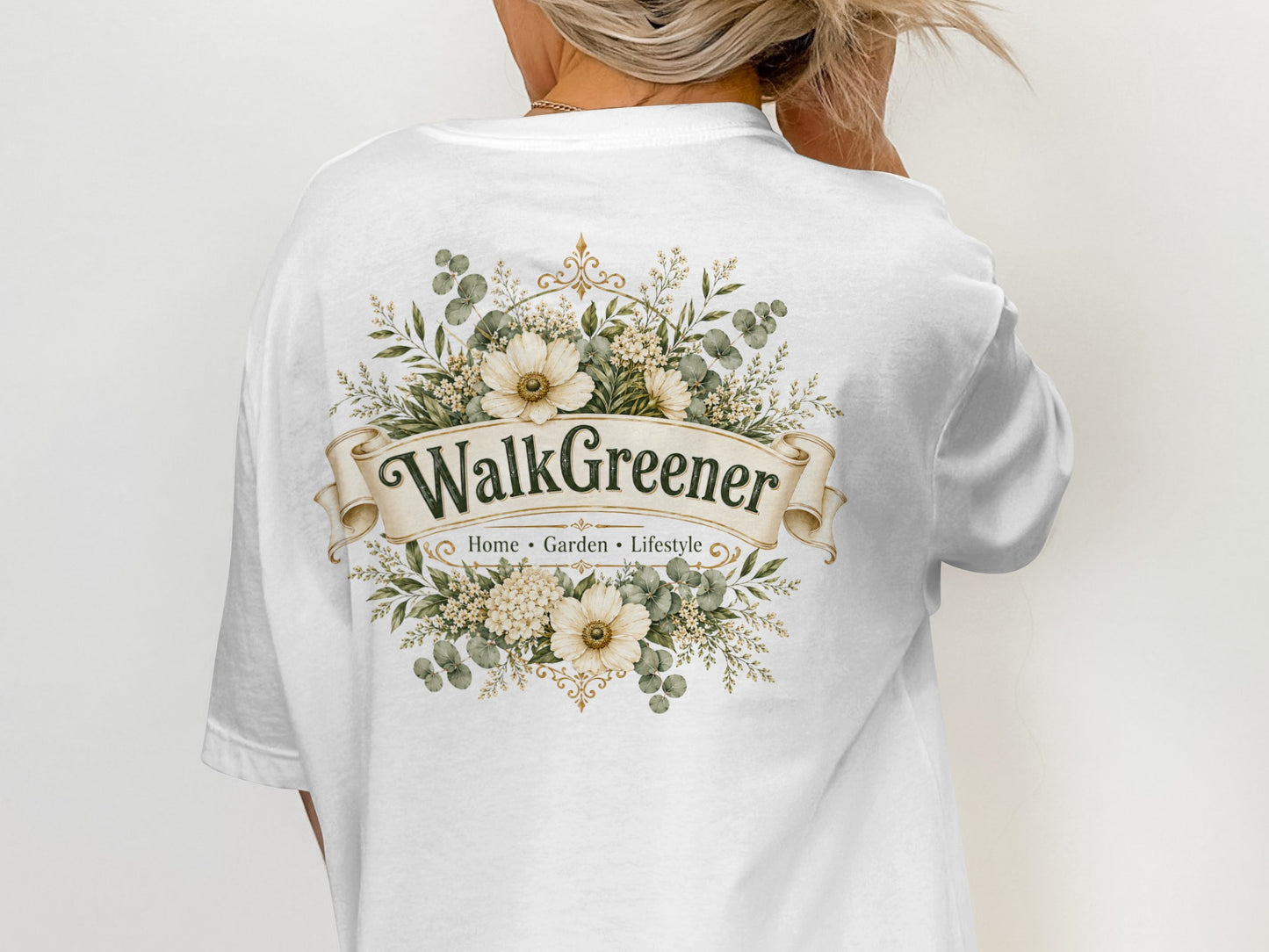 White t-shirt with a floral design and "WalkGreener Home Garden Lifestyle" text.