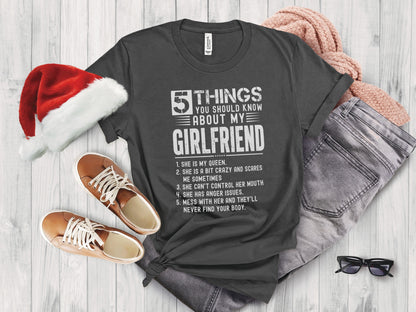 Dark grey t-shirt with "5 Things You Should Know About My Girlfriend" text.
