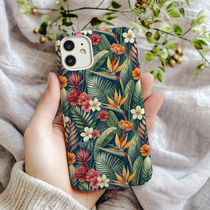 Close-up of the orange bird of paradise and hibiscus flower print on the phone case.