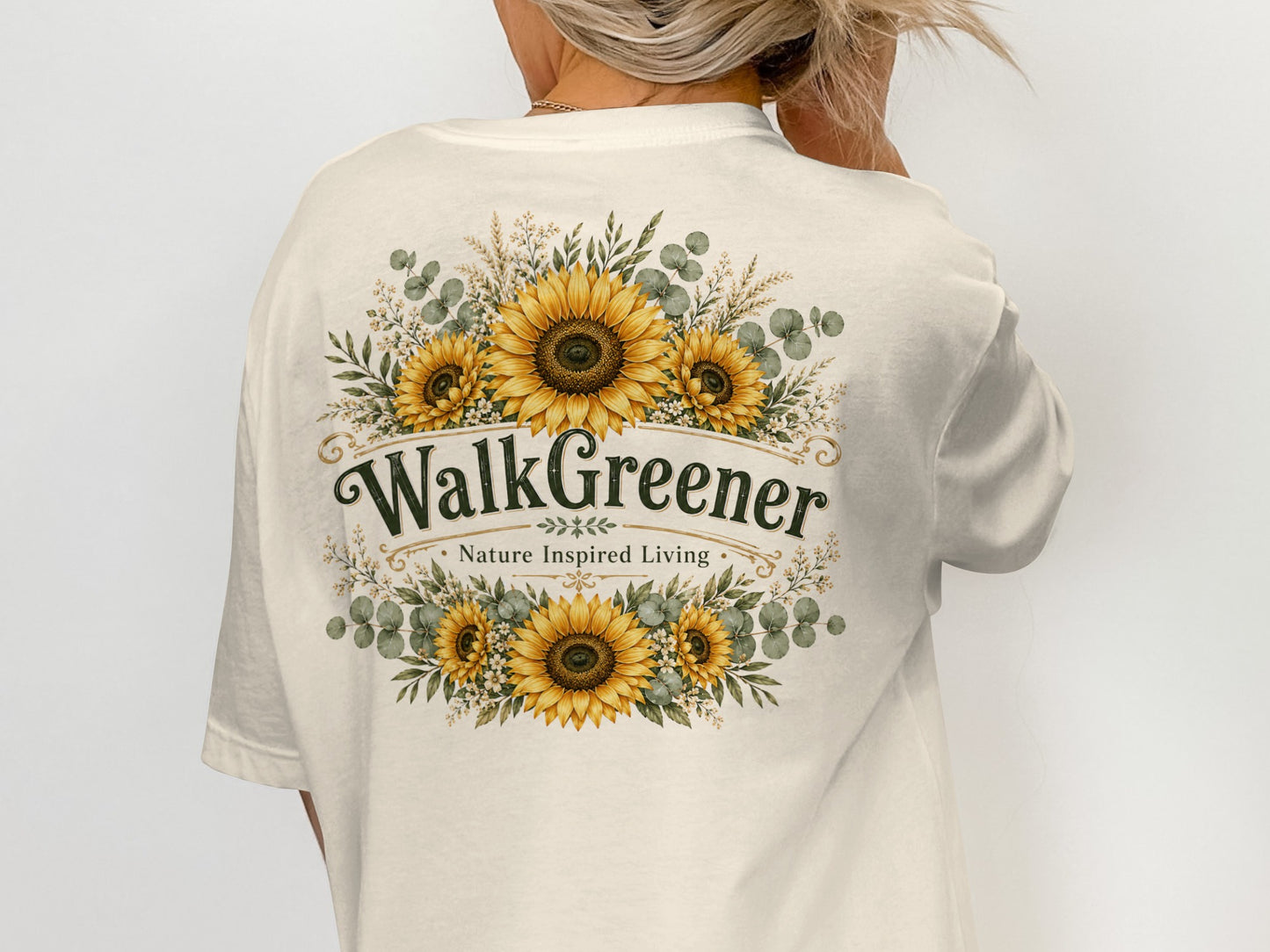 Cream t-shirt with "WalkGreener Nature Inspired Living" text and sunflower floral design.