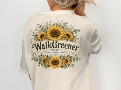 Cream t-shirt with "WalkGreener Nature Inspired Living" text and sunflower floral design.