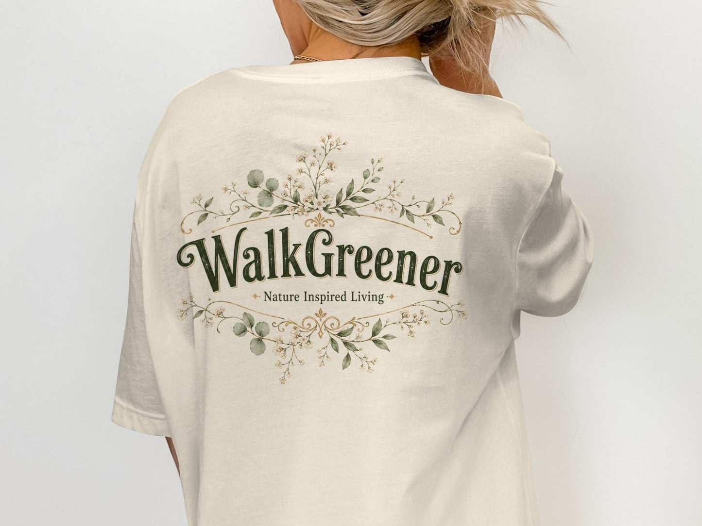 Cream t-shirt with "WalkGreener Nature Inspired Living" text and floral design.