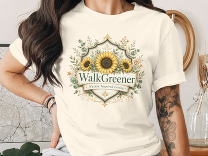 Cream t-shirt with "WalkGreener Nature Inspired Living" logo featuring sunflowers.
