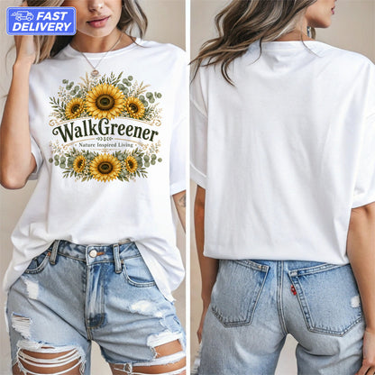 White t-shirt featuring sunflowers and the text "WalkGreener, Nature Inspired Living".