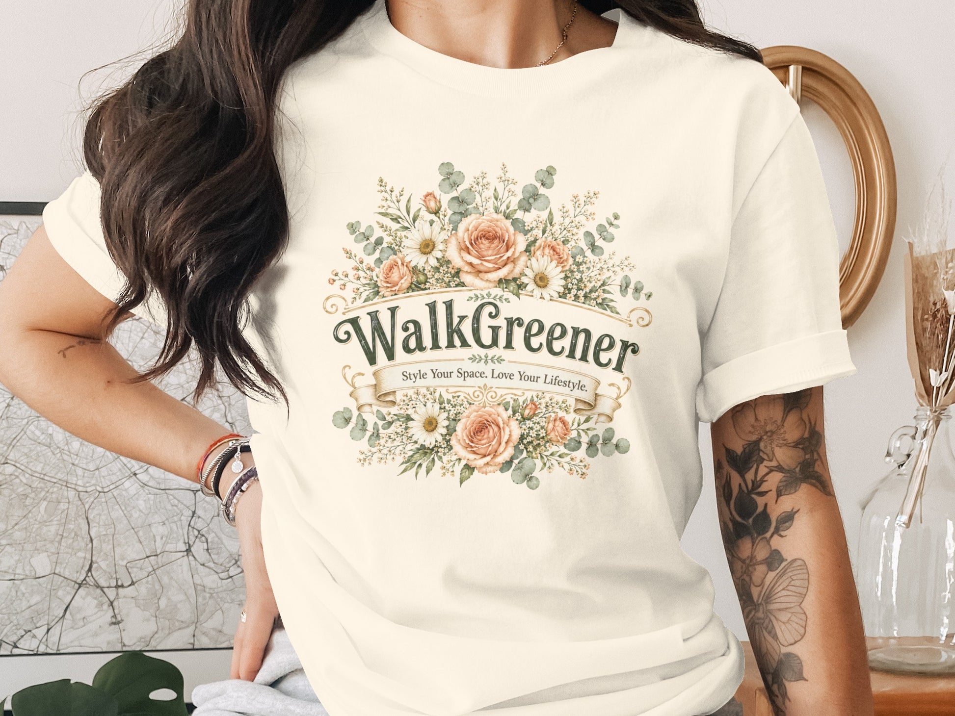 Crew neck t-shirt with "WalkGreener Style Your Space. Love Your Lifestyle." text and floral design.