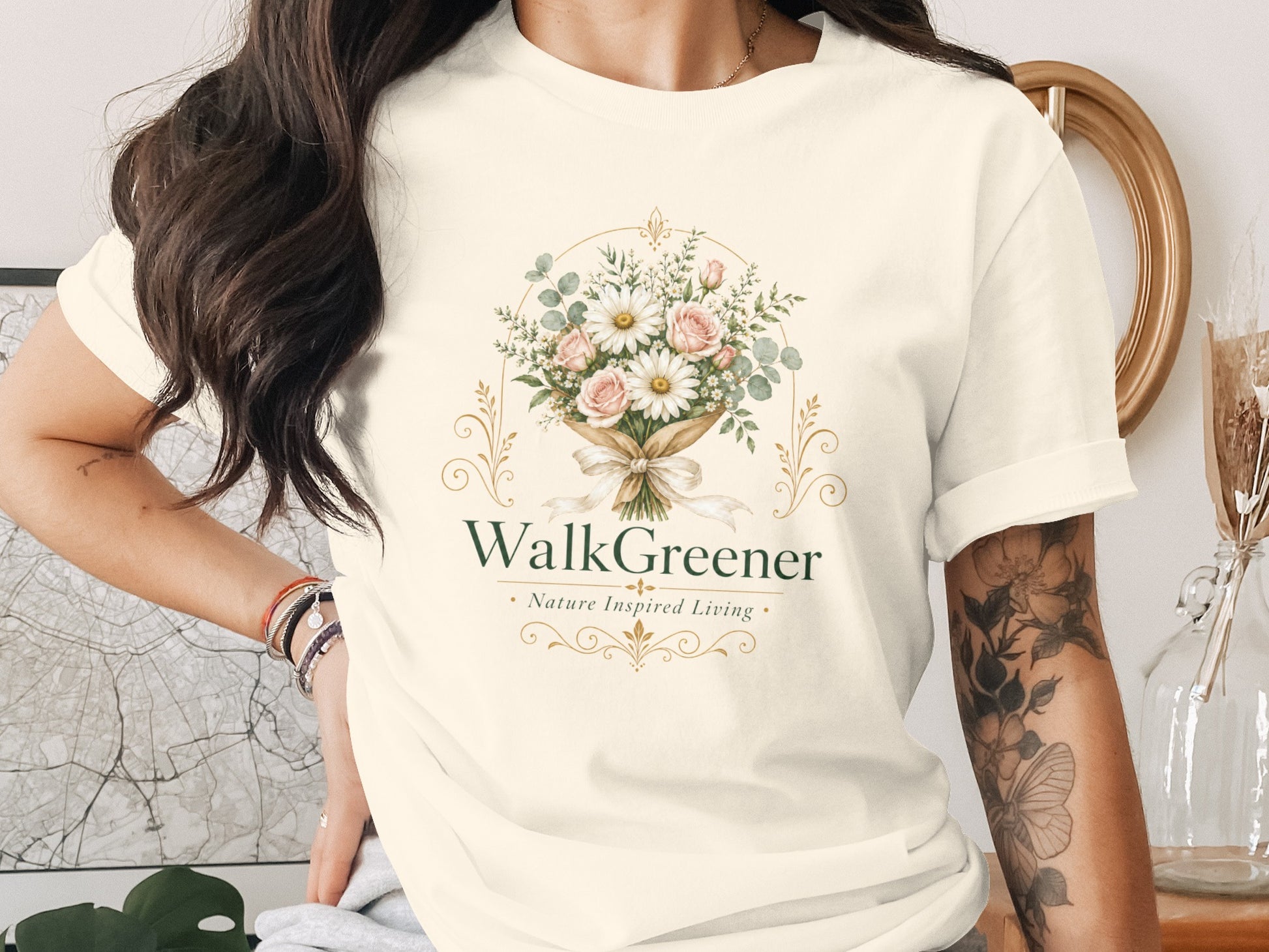 T-shirt with floral design and text "WalkGreener Nature Inspired Living".