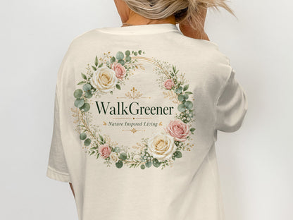 Cream t-shirt with floral wreath logo, "WalkGreener Nature Inspired Living".