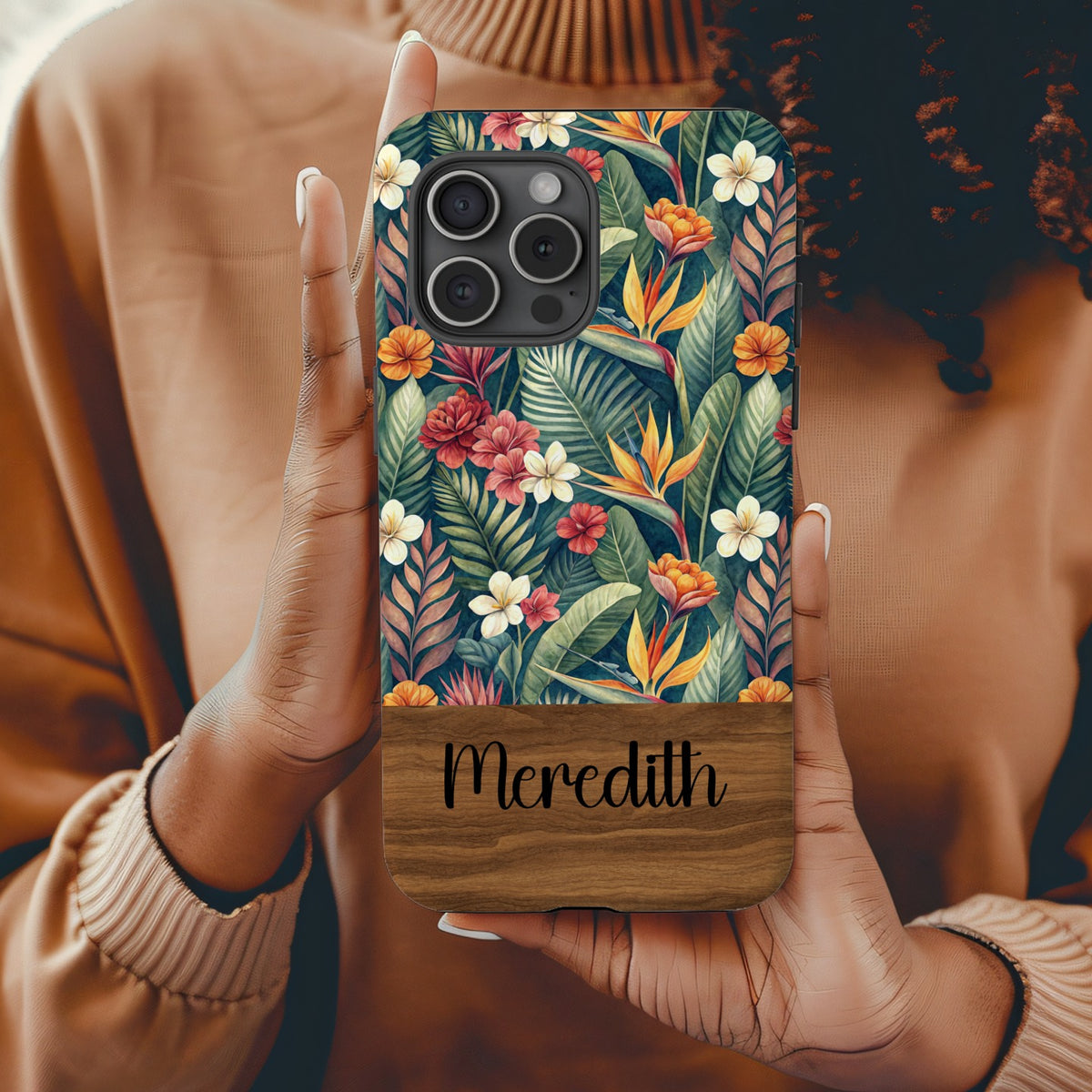 Side angle of the tropical botanical phone case showing glossy slim profile.