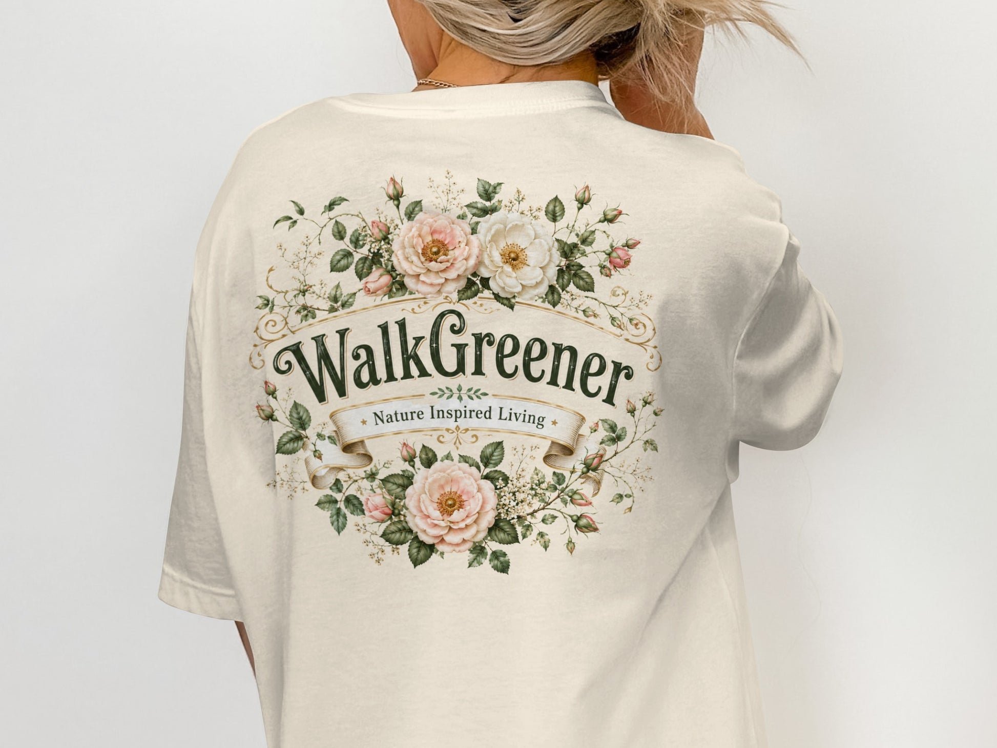 Cream t-shirt with "WalkGreener Nature Inspired Living" text and floral wreath design.