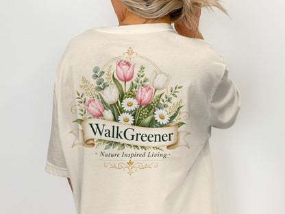 Cream t-shirt with a floral design and "WalkGreener Nature Inspired Living" text.