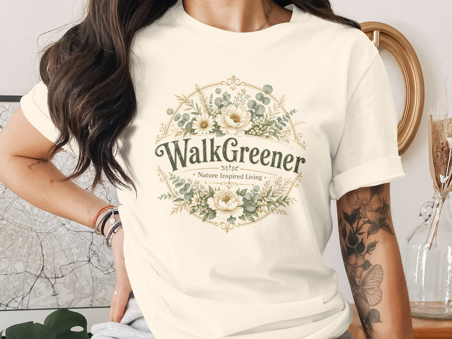 Cream t-shirt with WalkGreener Nature Inspired Living floral logo.