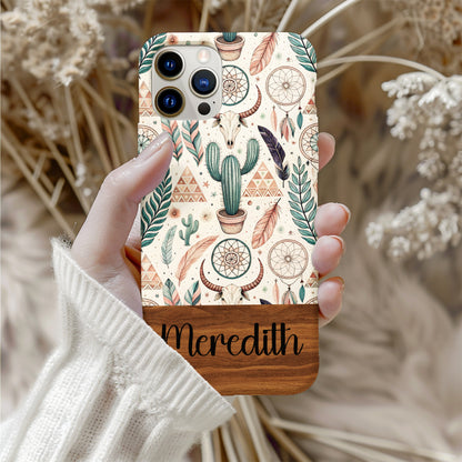 Personalized boho phone case with the custom name 'Meredith' printed on the wood-grain bottom panel