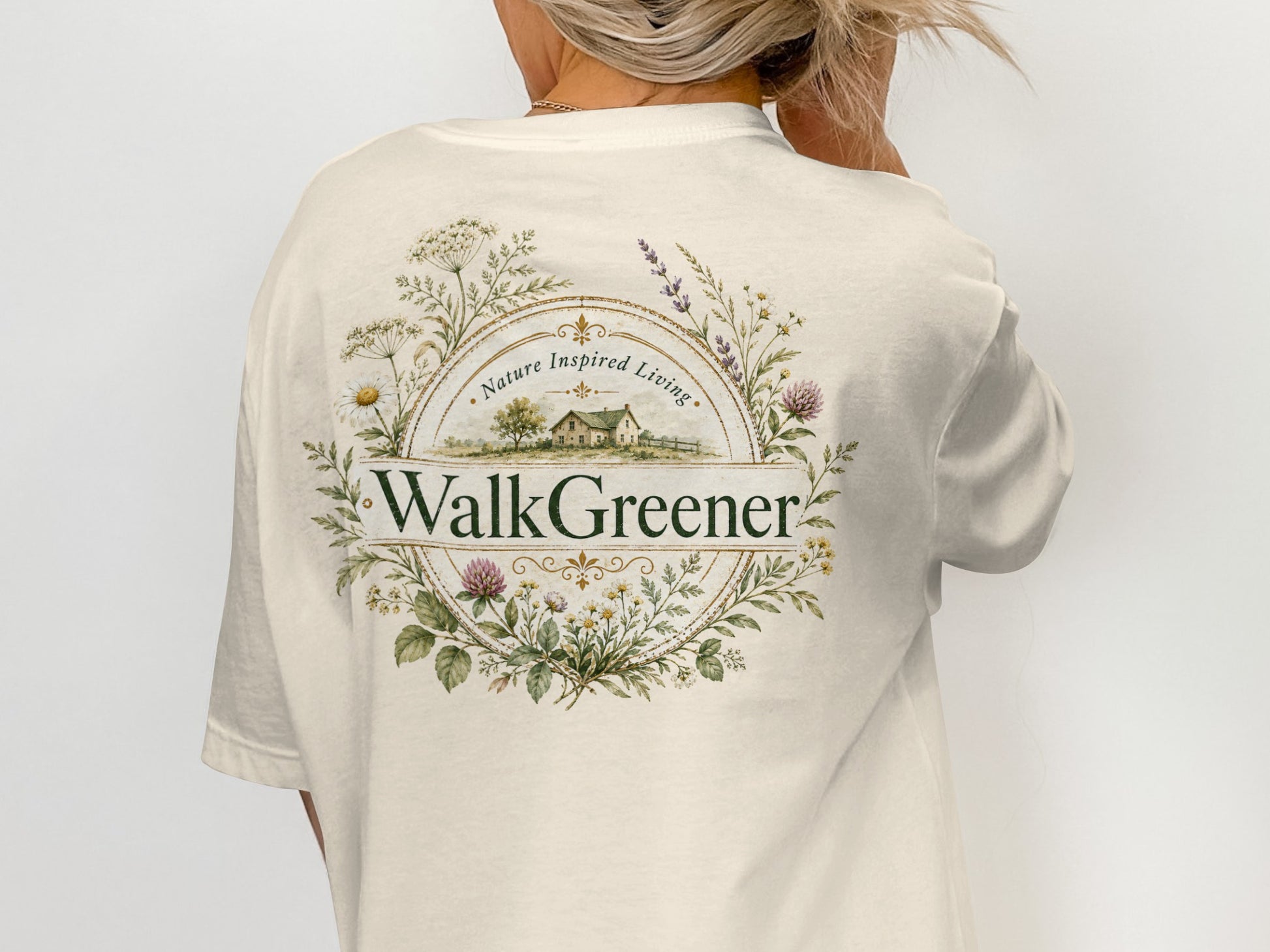 Cream t-shirt with "WalkGreener" and floral design featuring a house.