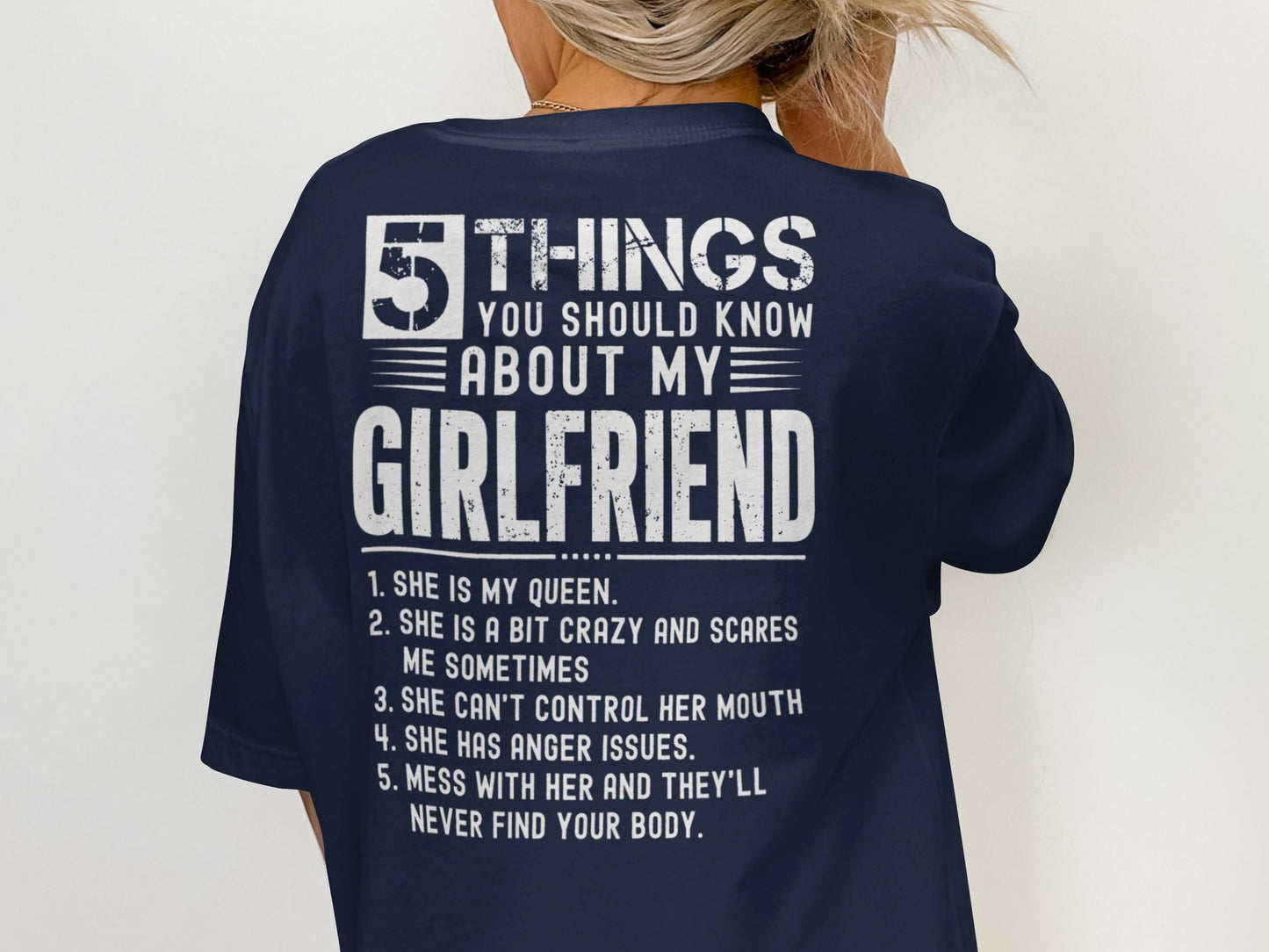 Dark blue shirt with white text: 5 Things You Should Know About My Girlfriend.