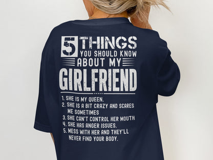 Dark blue shirt with white text: 5 Things You Should Know About My Girlfriend.