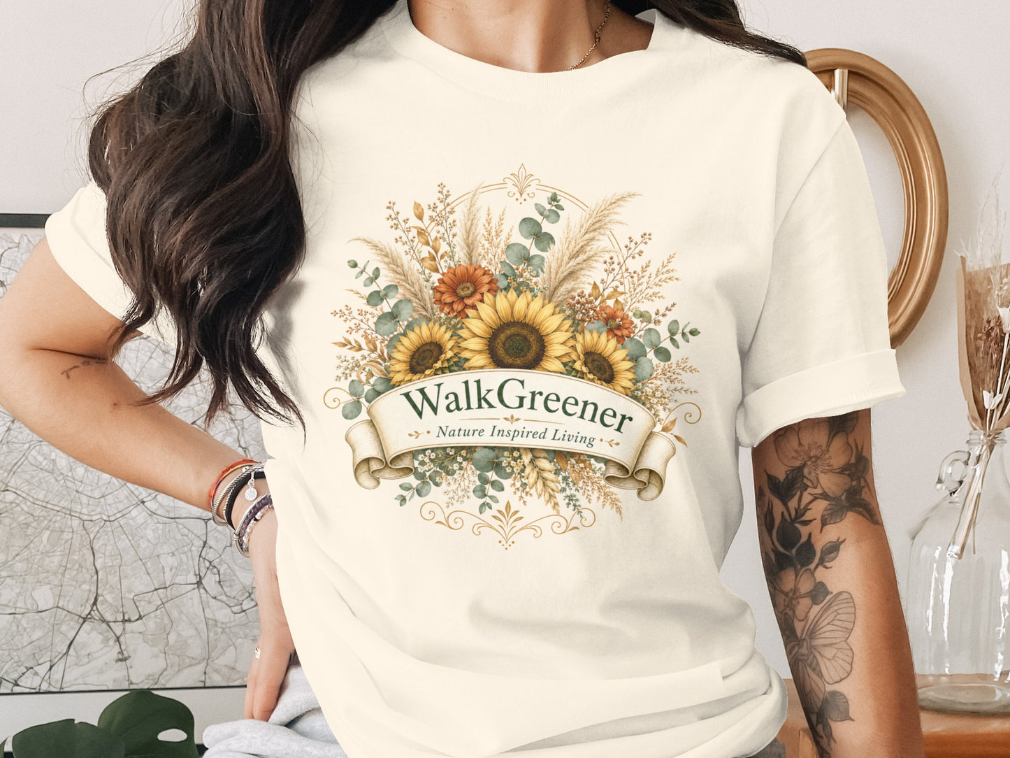 Cream t-shirt with WalkGreener Nature Inspired Living sunflower and floral design.
