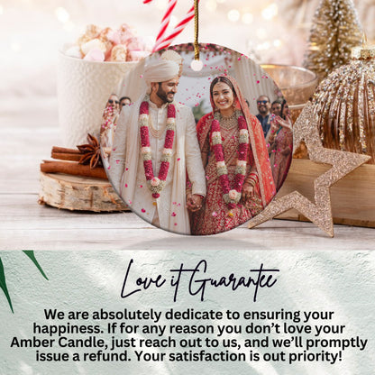 Circular ornament with wedding photo, surrounded by holiday decor, text about satisfaction guarantee.
