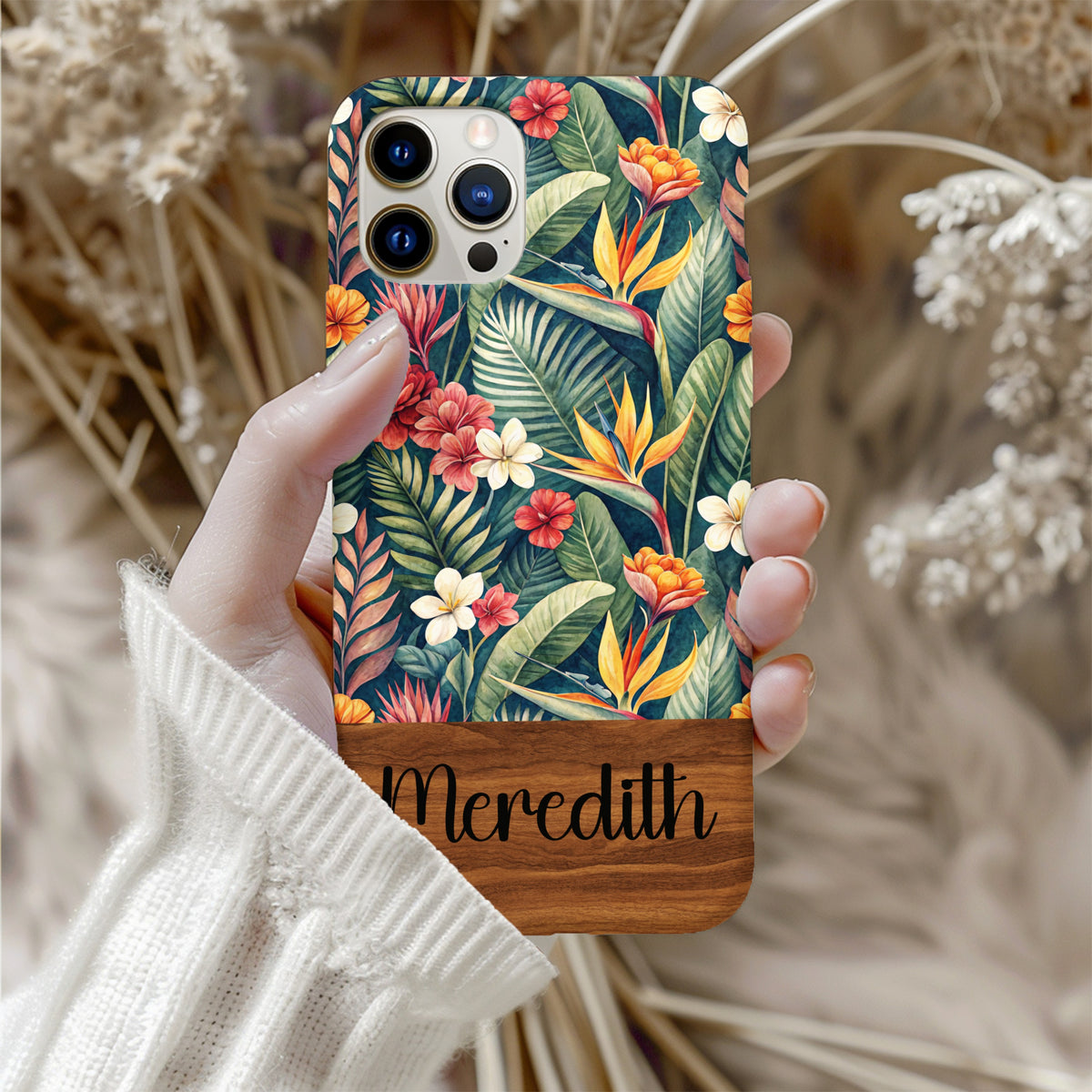 Close-up of the custom name plate on the tropical phone case.