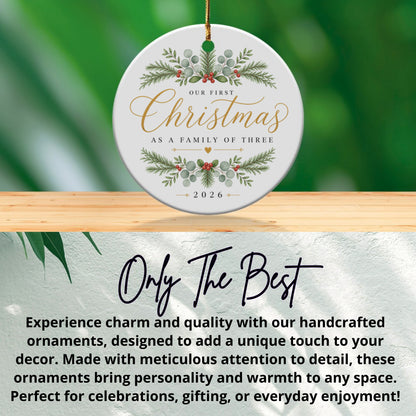 Round ornament: "Our First Christmas As A Family of Three 2026"