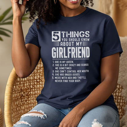 Navy t-shirt with white text listing five things to know about "My Girlfriend."
