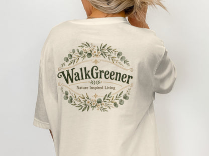 Cream t-shirt with a floral wreath graphic containing "WalkGreener Nature Inspired Living".