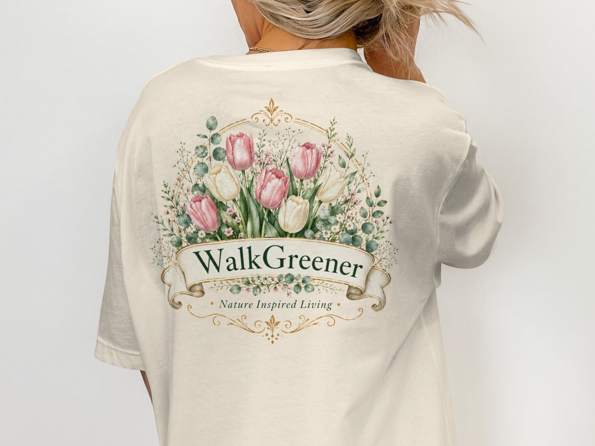 Cream t-shirt with "WalkGreener Nature Inspired Living" text and floral design.
