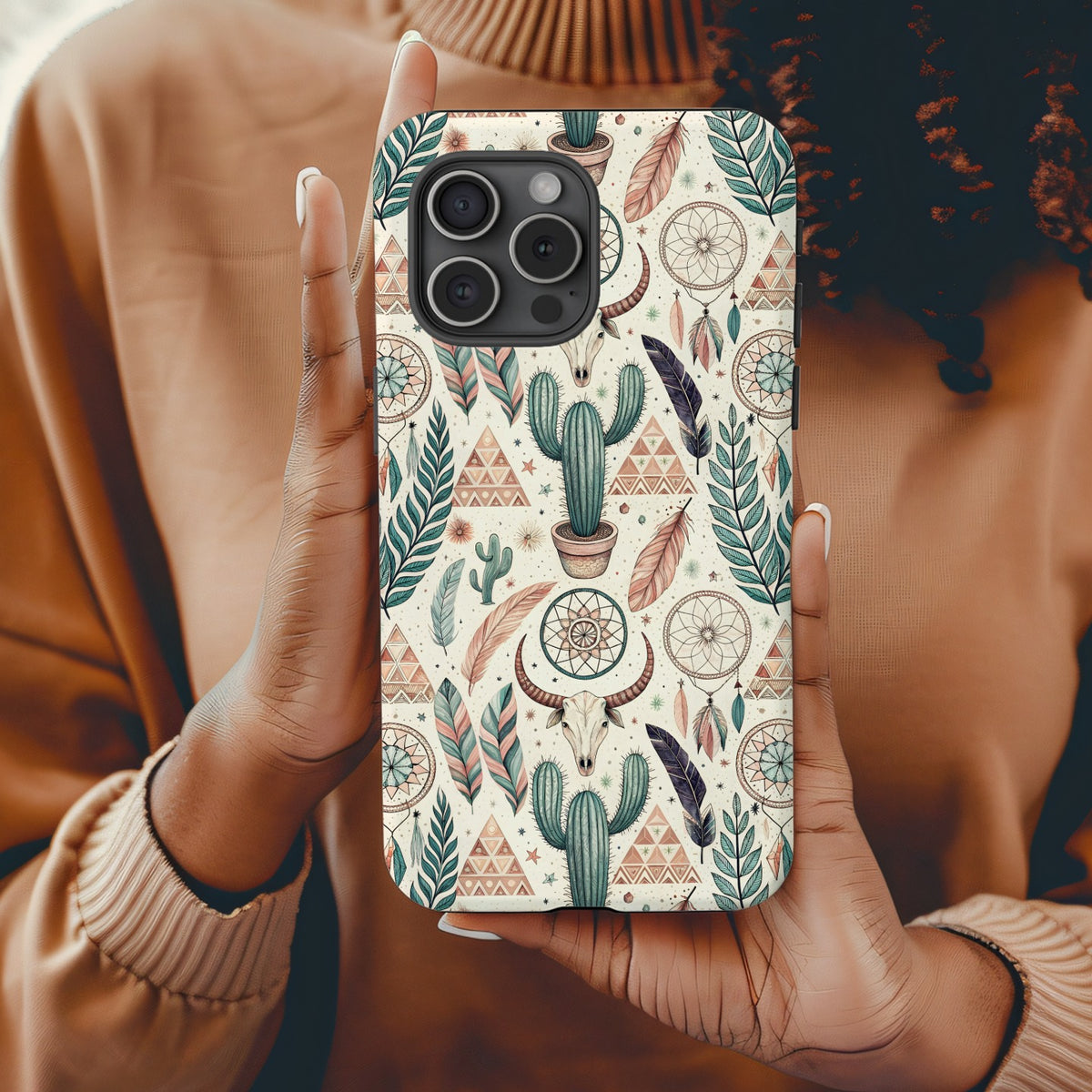 Boho cactus and feather patterned phone case laid flat to show the full repeating design