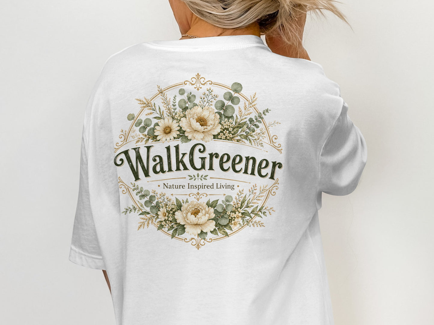 White t-shirt with "WalkGreener - Nature Inspired Living" text and floral emblem.