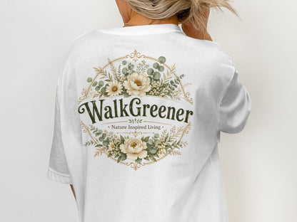 White t-shirt with "WalkGreener - Nature Inspired Living" text and floral emblem.