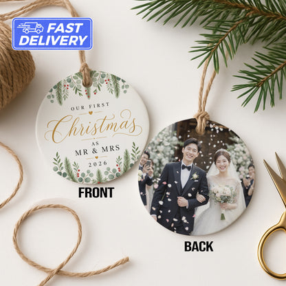 Round Christmas ornament with "Our First Christmas as Mr & Mrs 2026" and wedding photo.