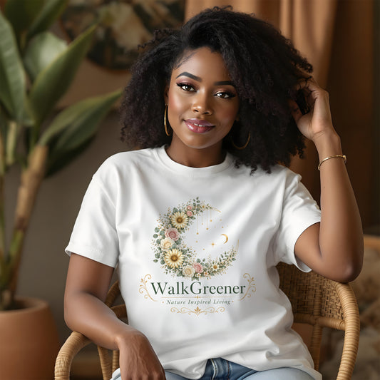 White t-shirt with floral crescent moon and "WalkGreener Nature Inspired Living" text.