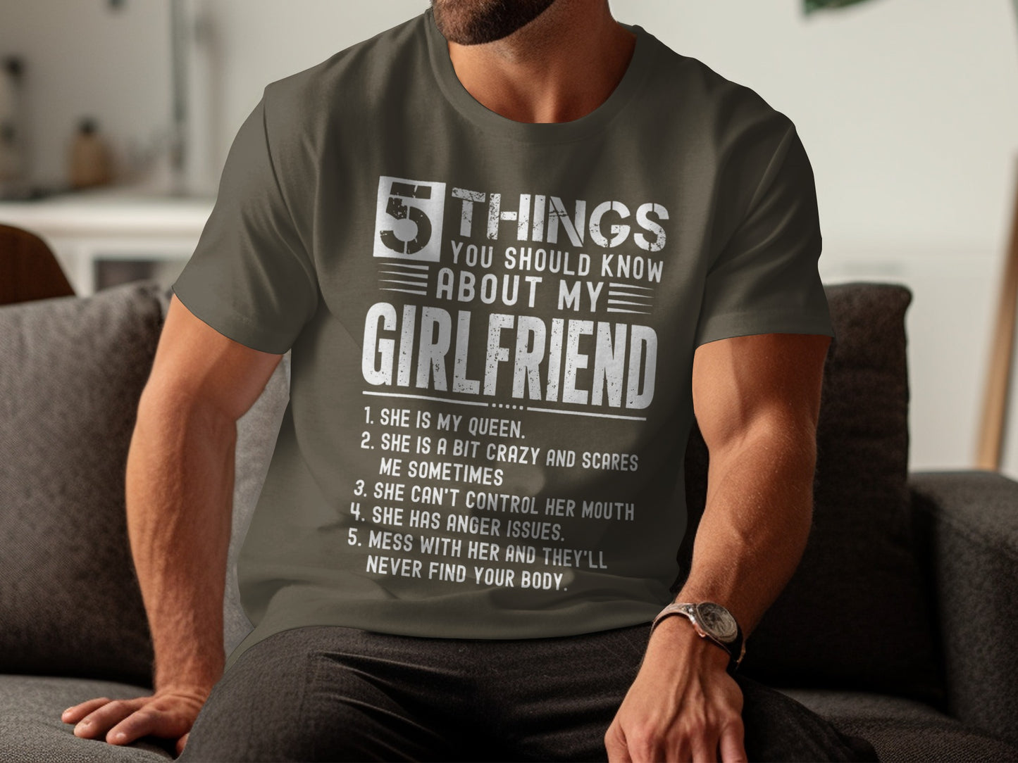 Olive green t-shirt with white text listing "5 Things You Should Know About My Girlfriend."