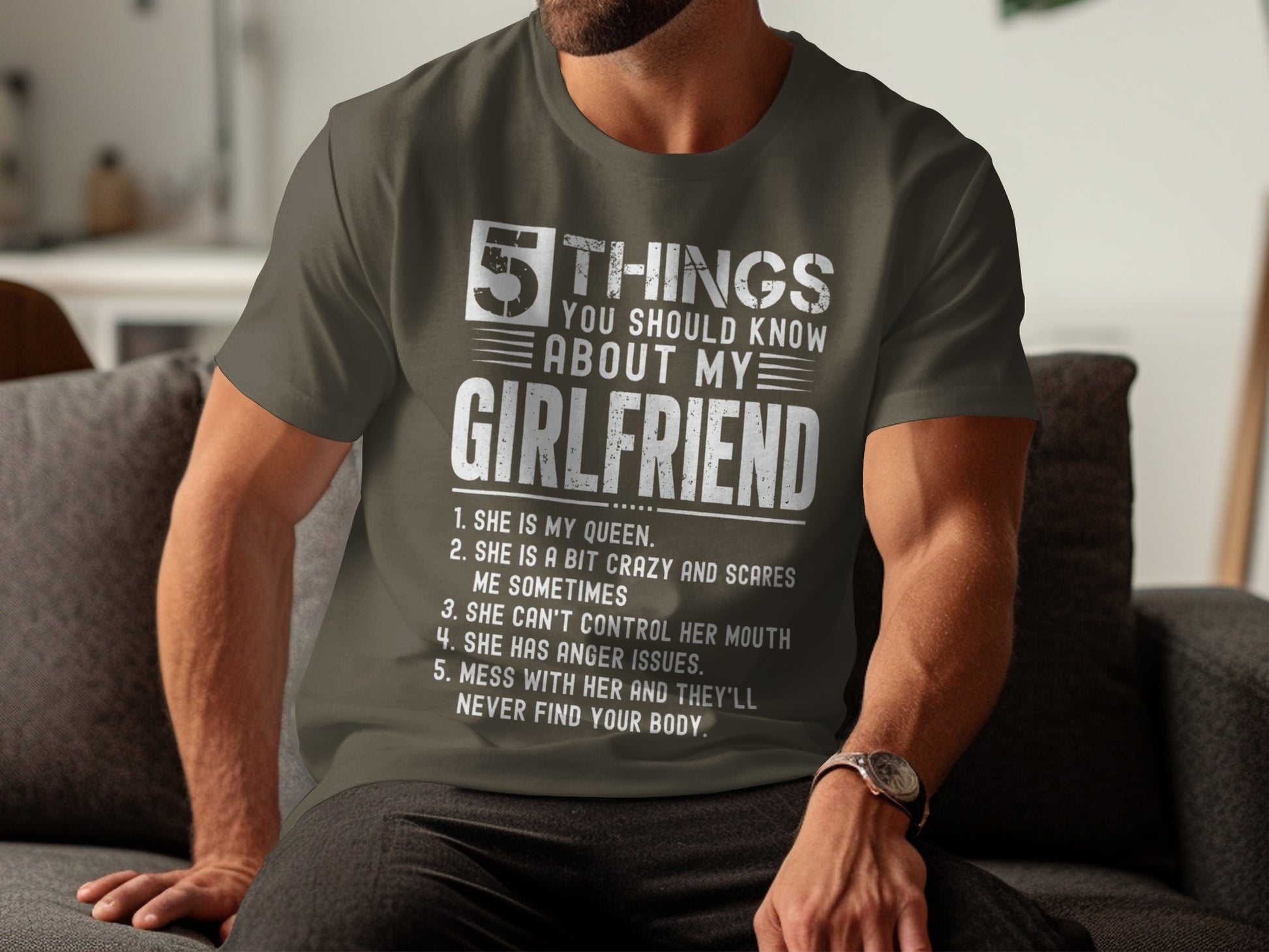 Olive green t-shirt with white text listing "5 Things You Should Know About My Girlfriend."