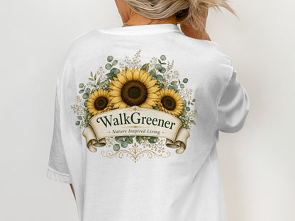 White t-shirt with sunflowers and "WalkGreener Nature Inspired Living" text.