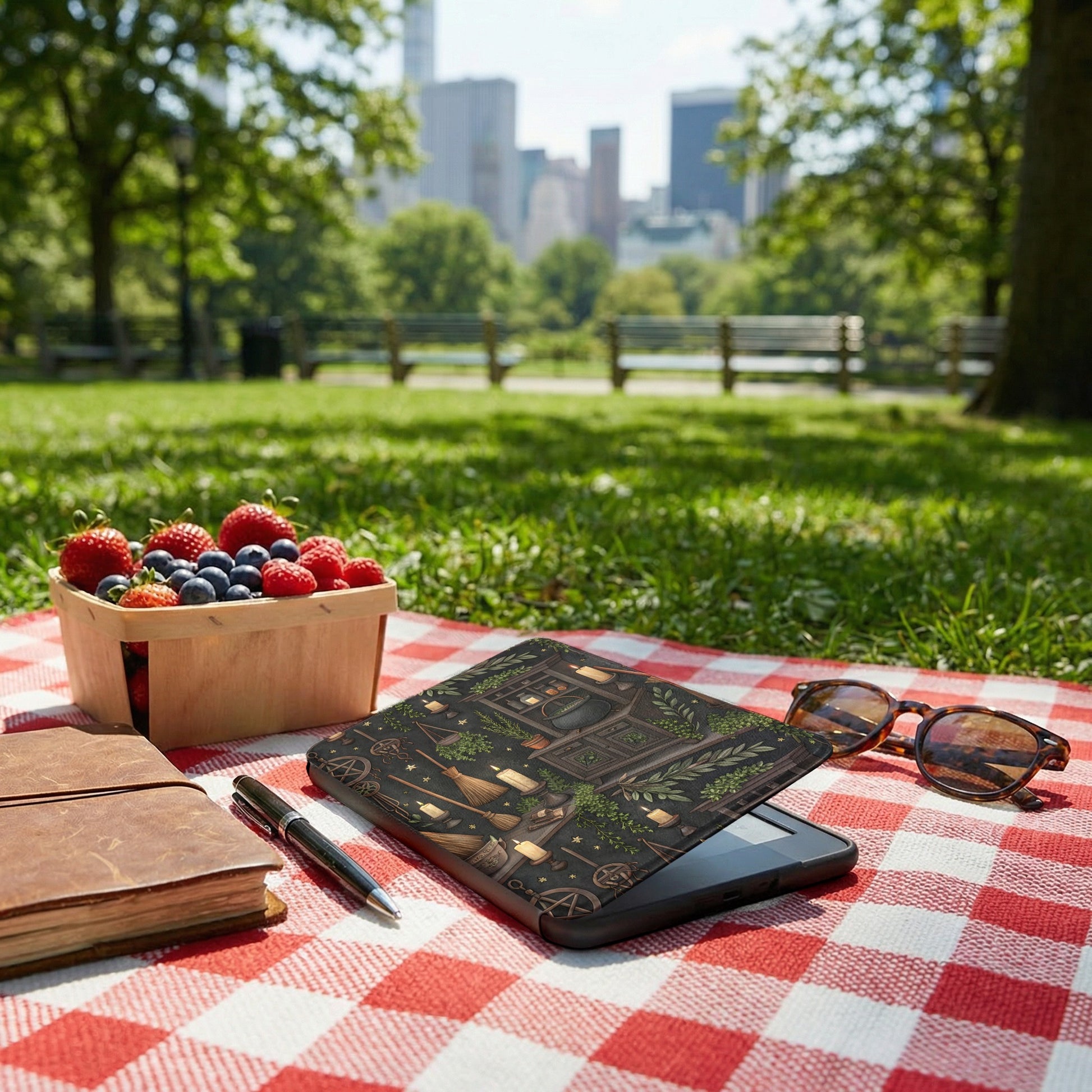 Scenic Outdoor Picnic Essentials with Notebook and Sunglasses
