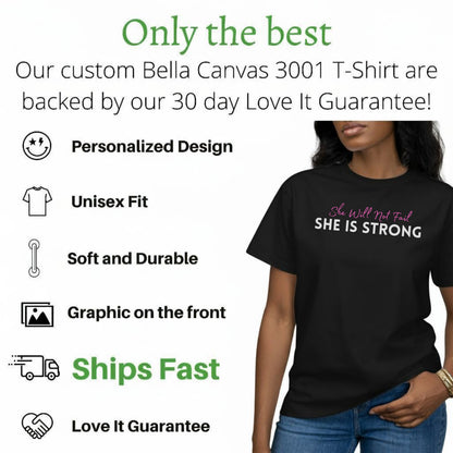 Black t-shirt with "She Will Not Fail SHE IS STRONG" graphic.