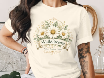 Cream t-shirt with "WalkGreener Nature Inspired Living" daisy floral logo.