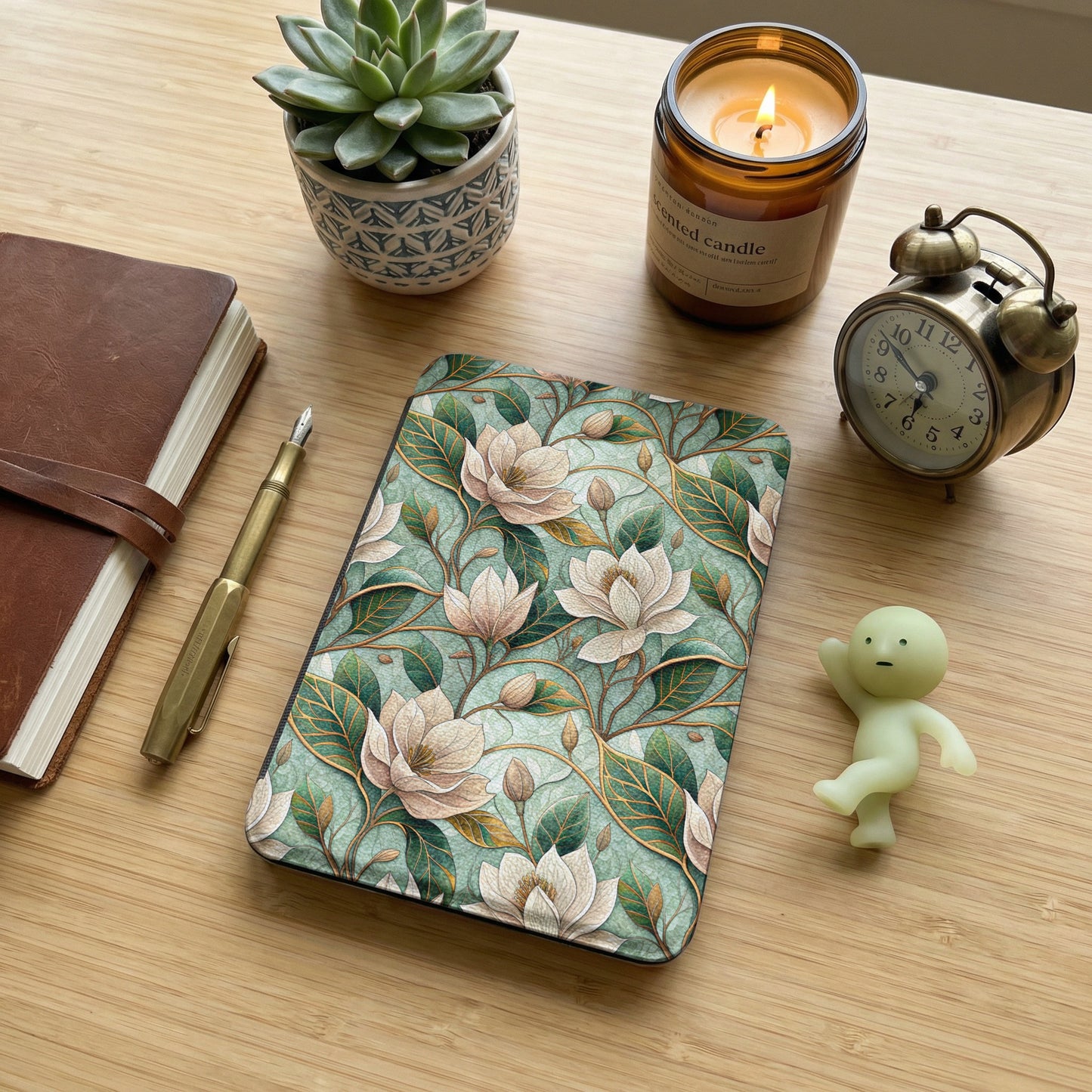 Floral Patterned Cover with Succulent and Candle Items