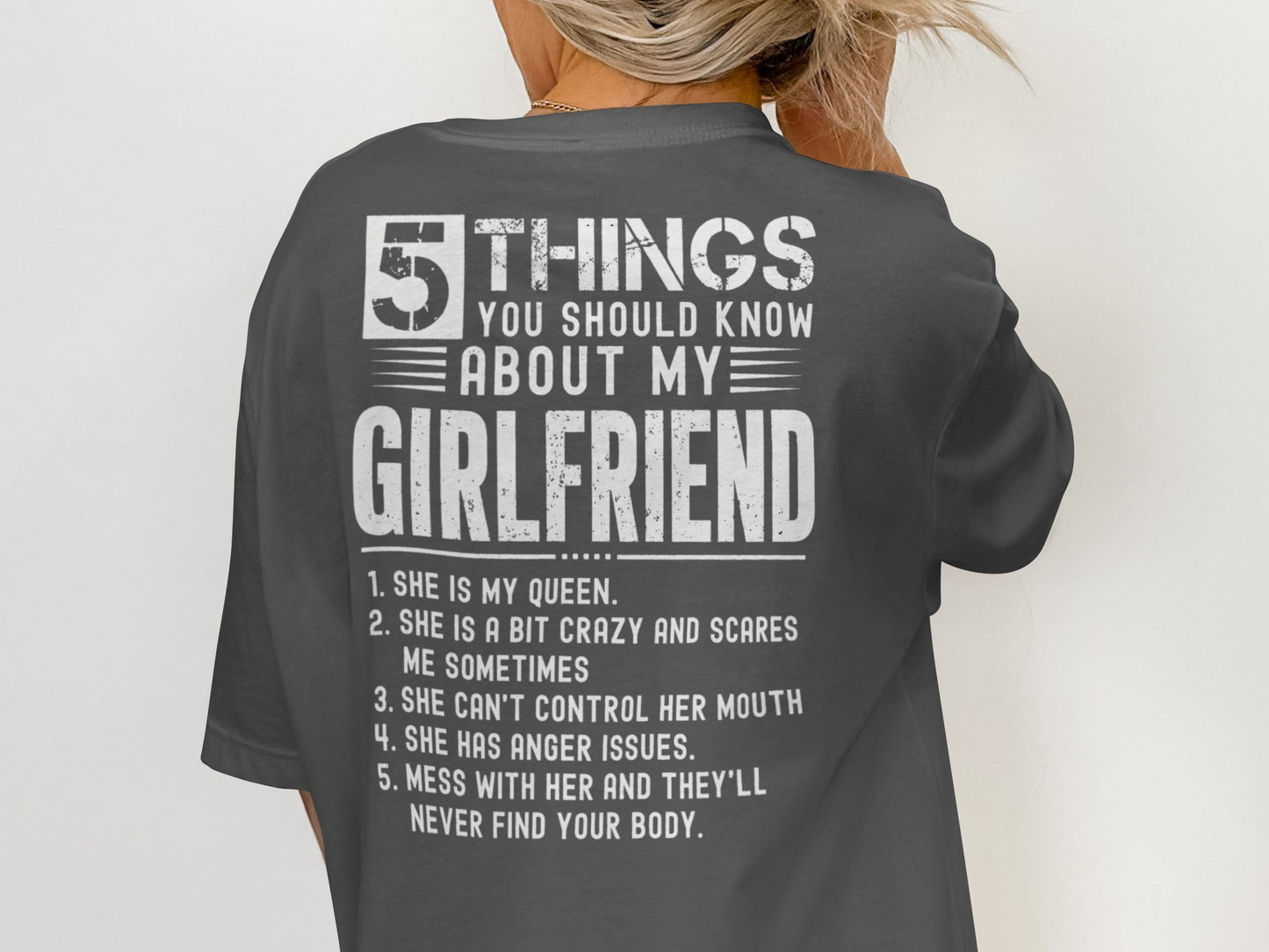 Dark grey t-shirt with white text: "5 THINGS YOU SHOULD KNOW ABOUT MY GIRLFRIEND".