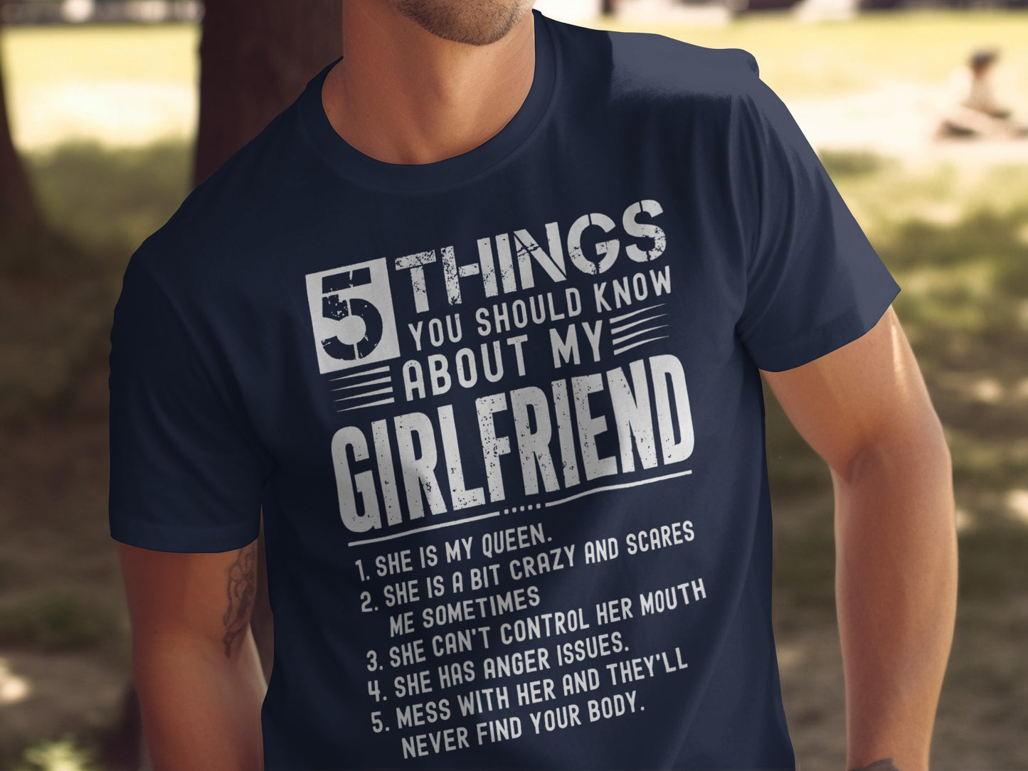 Navy t-shirt with white text listing "5 things you should know about my girlfriend."
