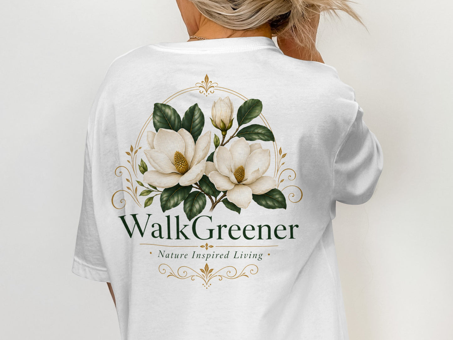 White t-shirt with a floral design and "Walk Greener" text.