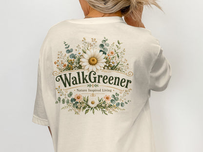 Cream t-shirt with a floral design and the text "WalkGreener Nature Inspired Living".